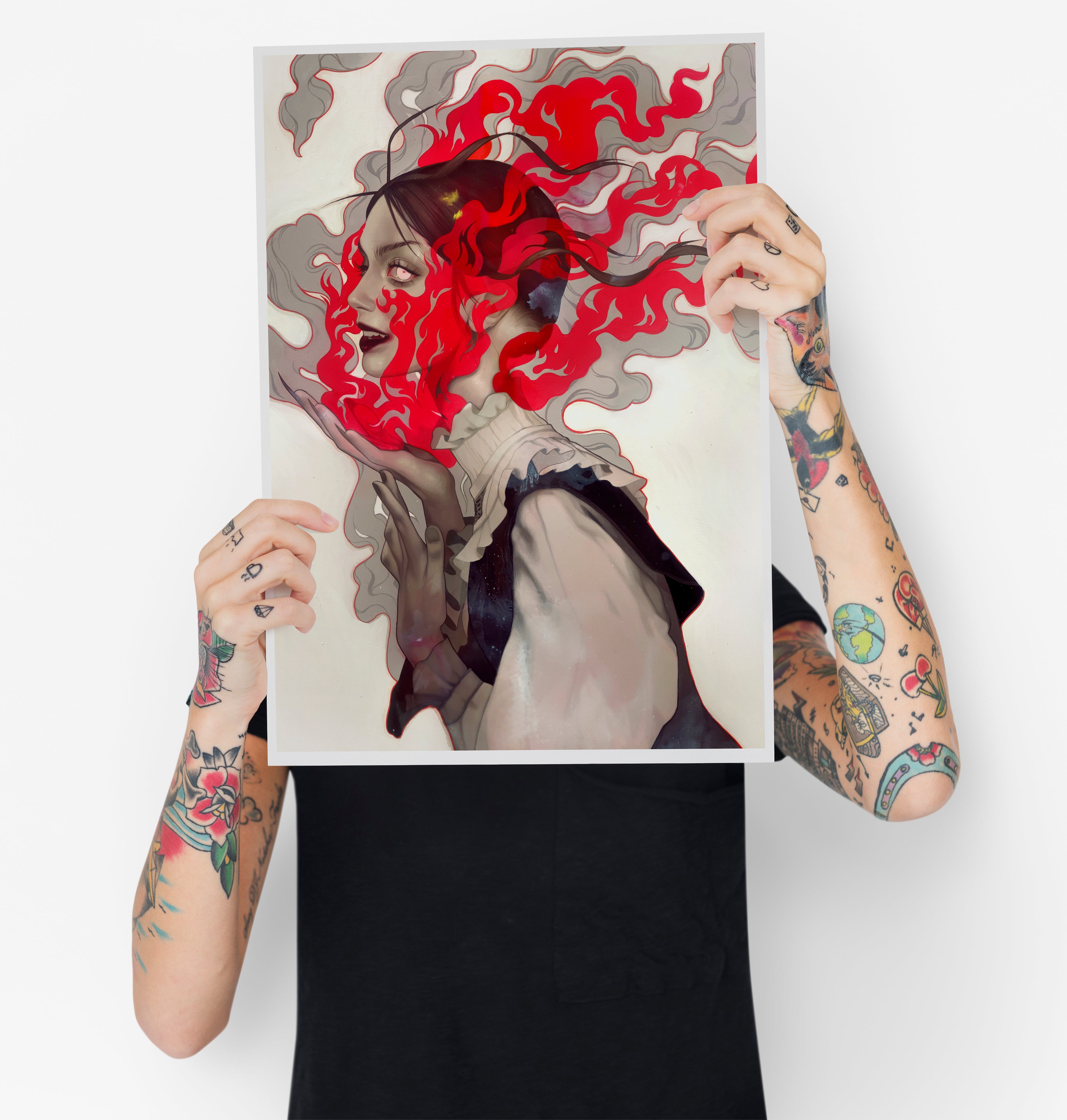 A tattooed individual displays Smile for Me, by Kelsey Beckett. This archival pigment print, signed and numbered, shows a profile with swirling gray and red abstract elements against a white backdrop.