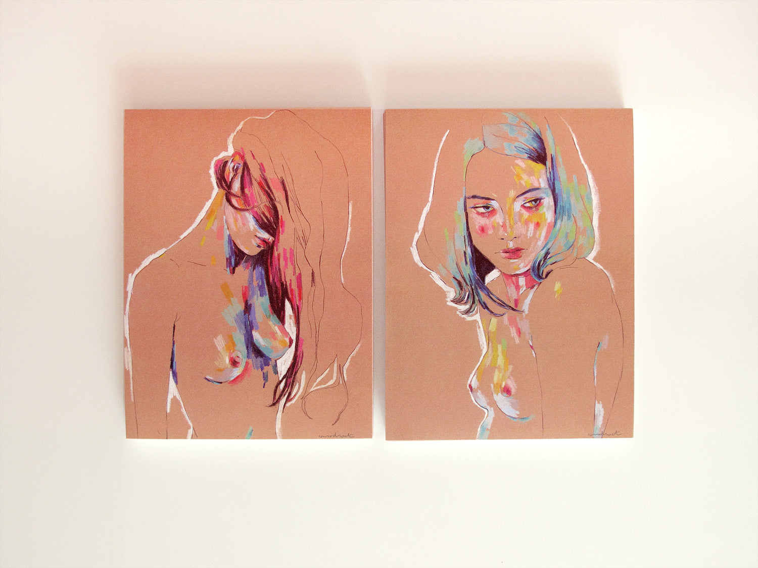 The Muse 829 & Muse 831 set by Conrad Roset features two abstract portraits on canvas. The left highlights a woman with flowing, colorful hair, while the right has vibrant facial and hair accents. Both exhibit a minimalistic flair against a brown background, capturing an archival pigment print essence.
