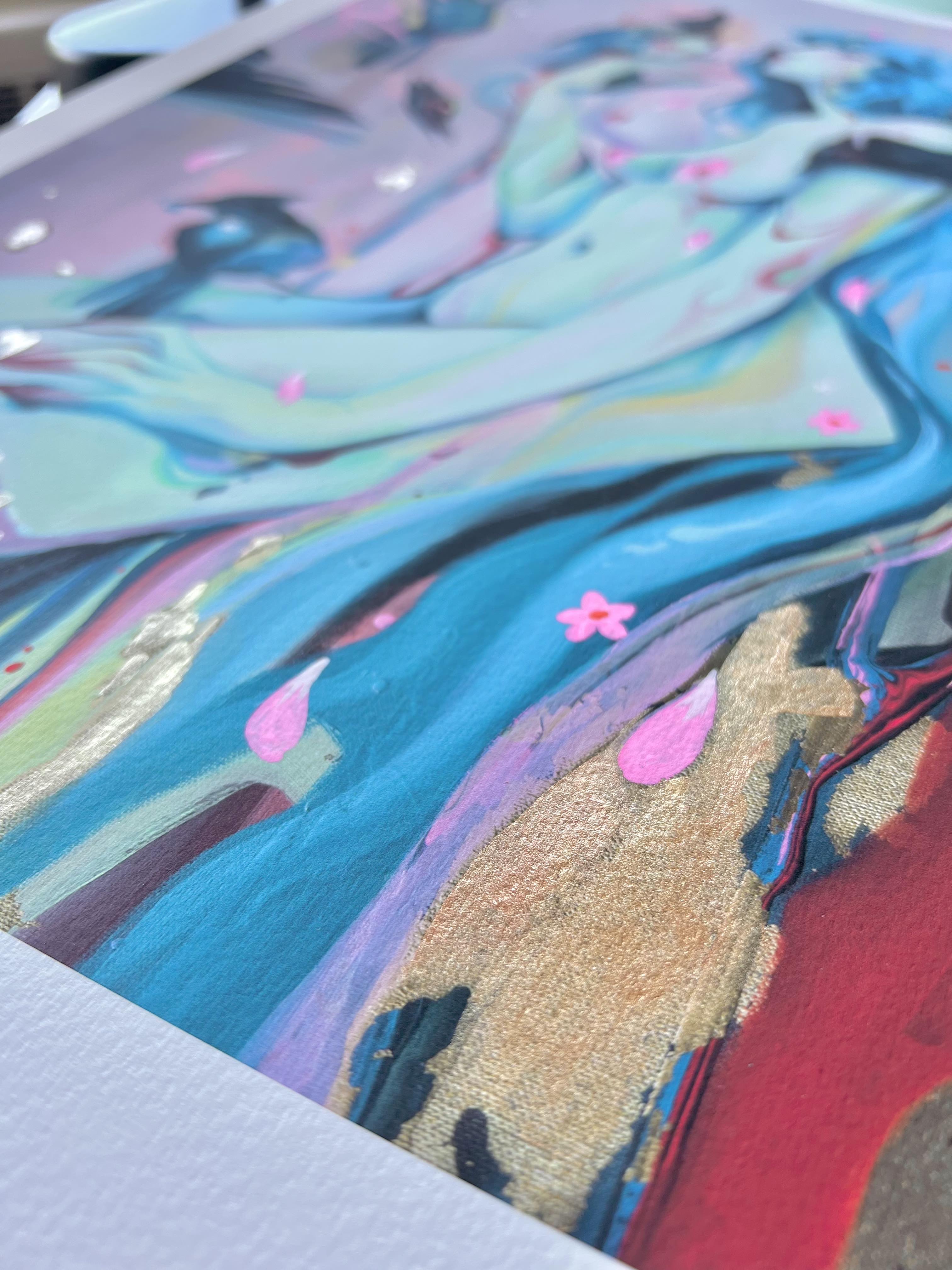 Close-up of Death & Transformation by Audra Auclair, an Archival Pigment Print with abstract shapes and flowing forms in blue, pink, and gold hues. Pink flower petals scattered throughout enhance its movement and vibrancy, inspired by Audra Auclairs innovative style.