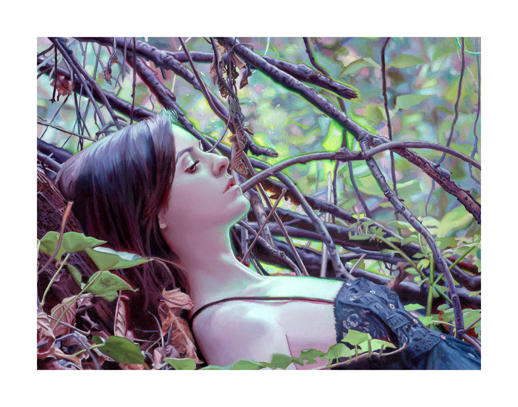 In the limited edition fine art giclee print Solitude by Rod Luff, a dark-haired woman in a strapless dress reclines among intertwined branches and vibrant green foliage, with sunlight filtering through the leaves to cast a soft, colorful glow.