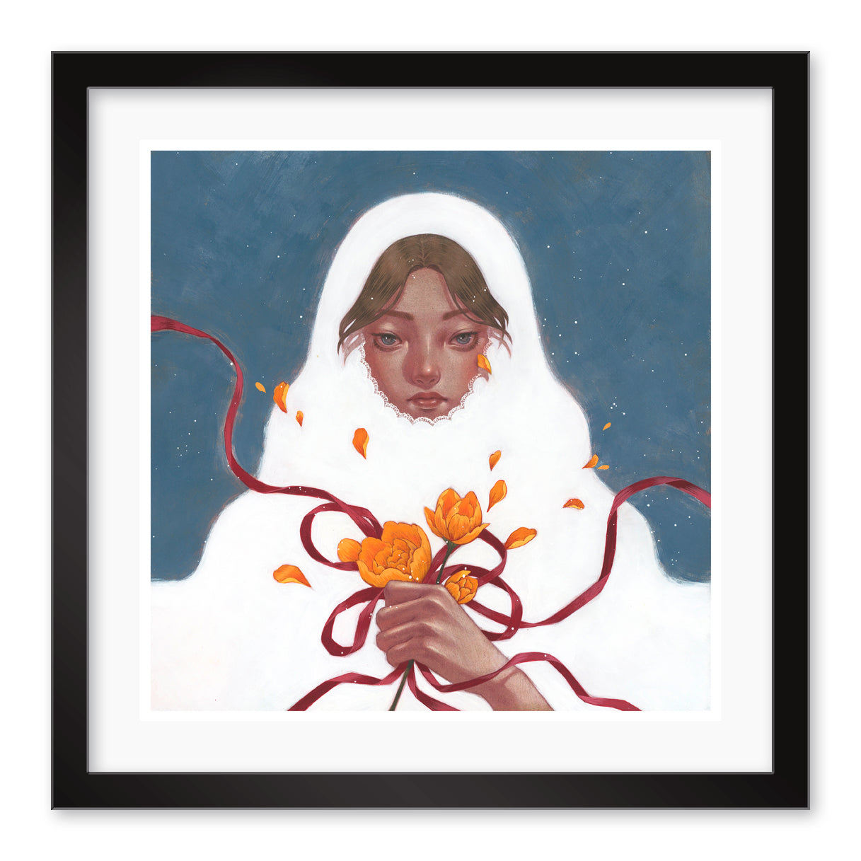 Against a blue backdrop, a woman in a white cloak holds orange flowers with a red ribbon. Titled Winter Bride, this archival pigment print by Shoko Ishida is framed in black, showcasing her serene expression and strands of brown hair.