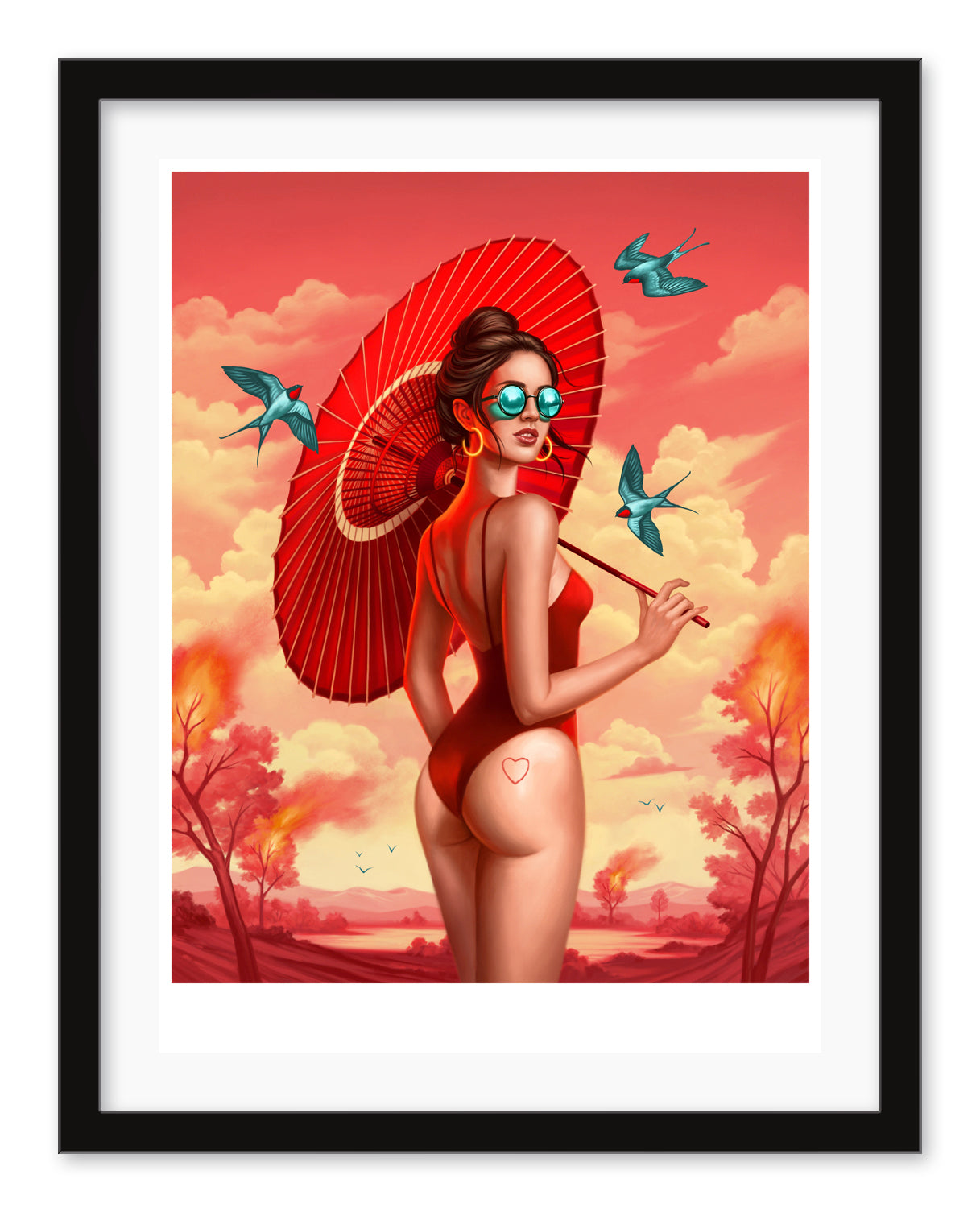In Allison Reimolds archival pigment print Malibu, a woman in a red swimsuit and sunglasses stands with a red parasol against a fiery sky, featuring a heart tattoo on her thigh as blue birds fly around her amidst surreal, vibrant colors.