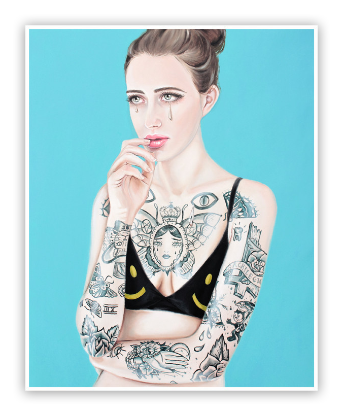 Stigma II by Crajes features a woman on a light blue backdrop, wearing a black top with yellow smiley faces. Her thoughtful expression and tattooed arms, including a heart-shaped clock and flowers, complement her neatly tied hair in this fine art giclee print.