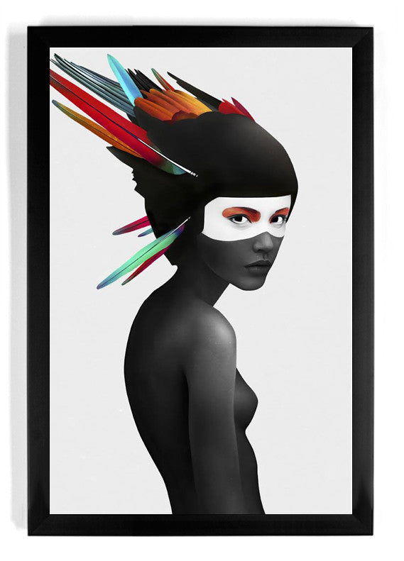 Hana by Ruben Ireland features a black-painted person with a mask-like white face, gazing sideways. They wear an elaborate headdress with colorful pointed feathers. The fine art image is elegantly framed with a simple black border.