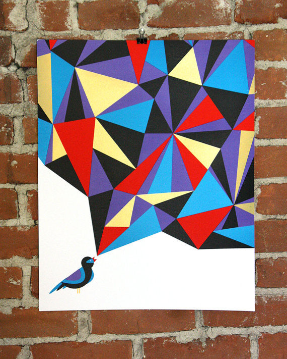 Nate Duvals Bird 2 features a vibrant screenprint of a bird in the lower-left corner, singing into an abstract mosaic of blue, red, yellow triangles with metallic gold accents against a brick wall backdrop.