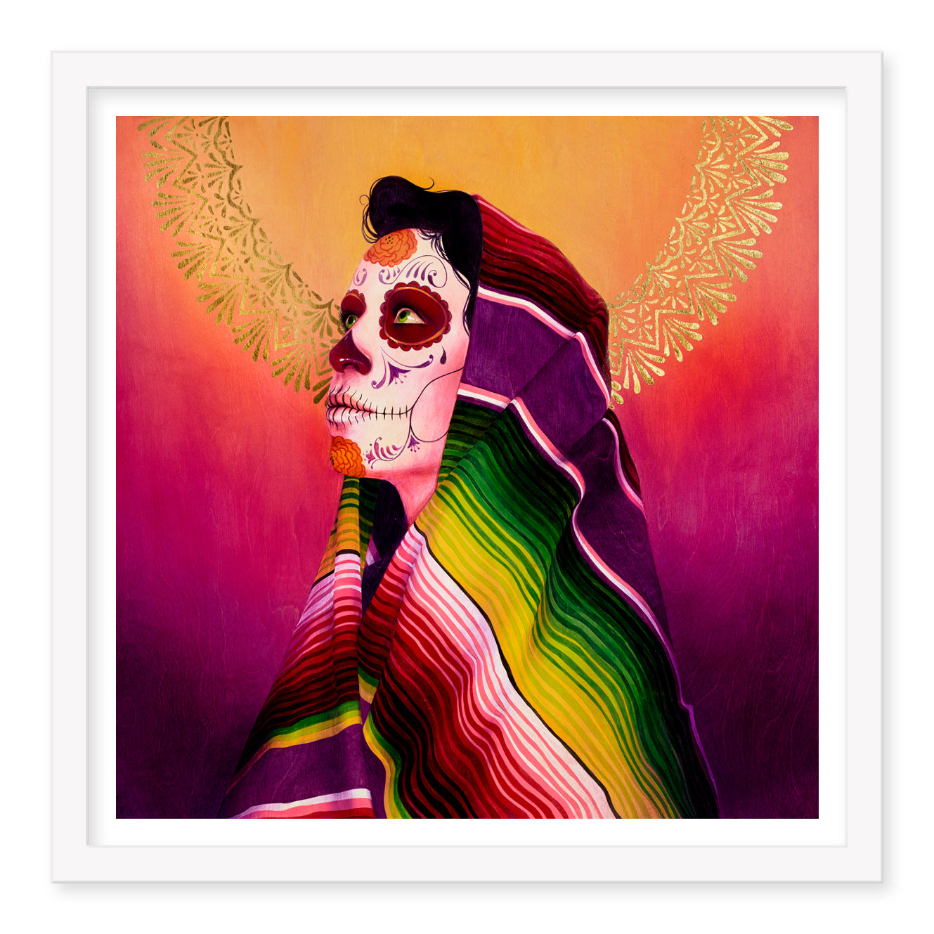 A person adorned with Day of the Dead face paint is wrapped in a Serape Morado by Sylvia Ji, set against a halo-like ornate golden backdrop and a striking orange-to-pink gradient, reminiscent of Sylvia Jis limited edition prints.