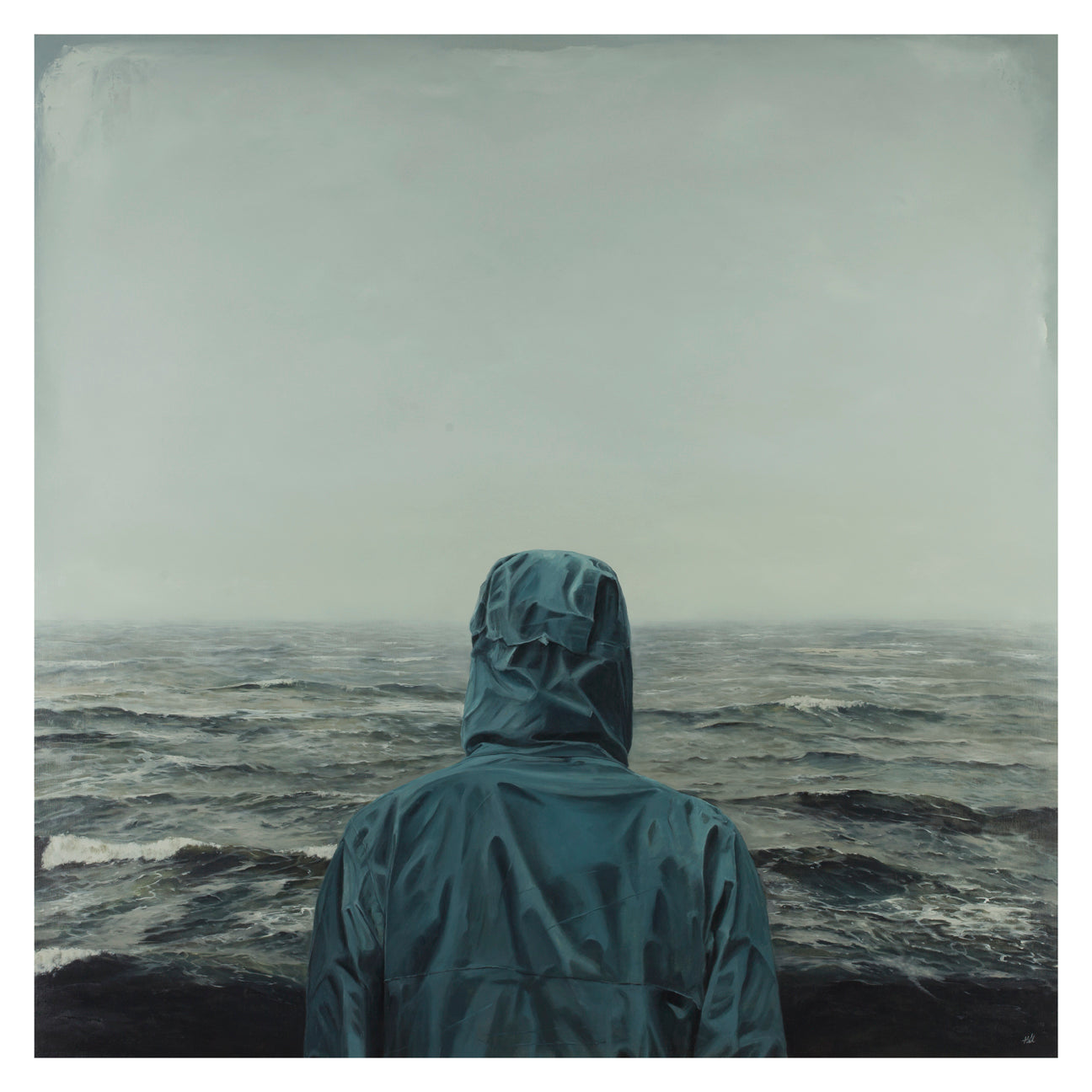 A person in a raincoat faces a vast, turbulent sea beneath an overcast sky, embodying solitude and contemplation. This striking scene is captured as the signed, numbered limited edition archival pigment print titled Feel It Running Down My Spine by Adam Hall.