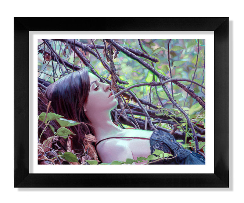 The Solitude framed fine art giclee print by Rod Luff portrays a serene woman resting among lush, tangled branches and leaves. Her closed eyes and the soft, dappled light create a peaceful, dreamlike ambiance.
