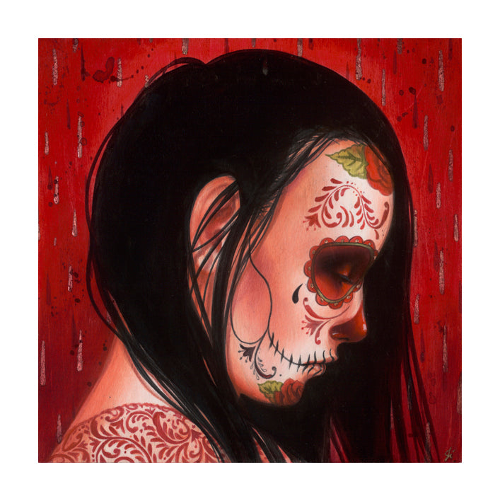The Alma Perdida Artists Proof by Sylvia Ji portrays a woman with long black hair, adorned with red floral sugar skull face paint. She is set against a red background featuring vertical streaks and delicate skin patterns, evoking a somber and artistic mood.