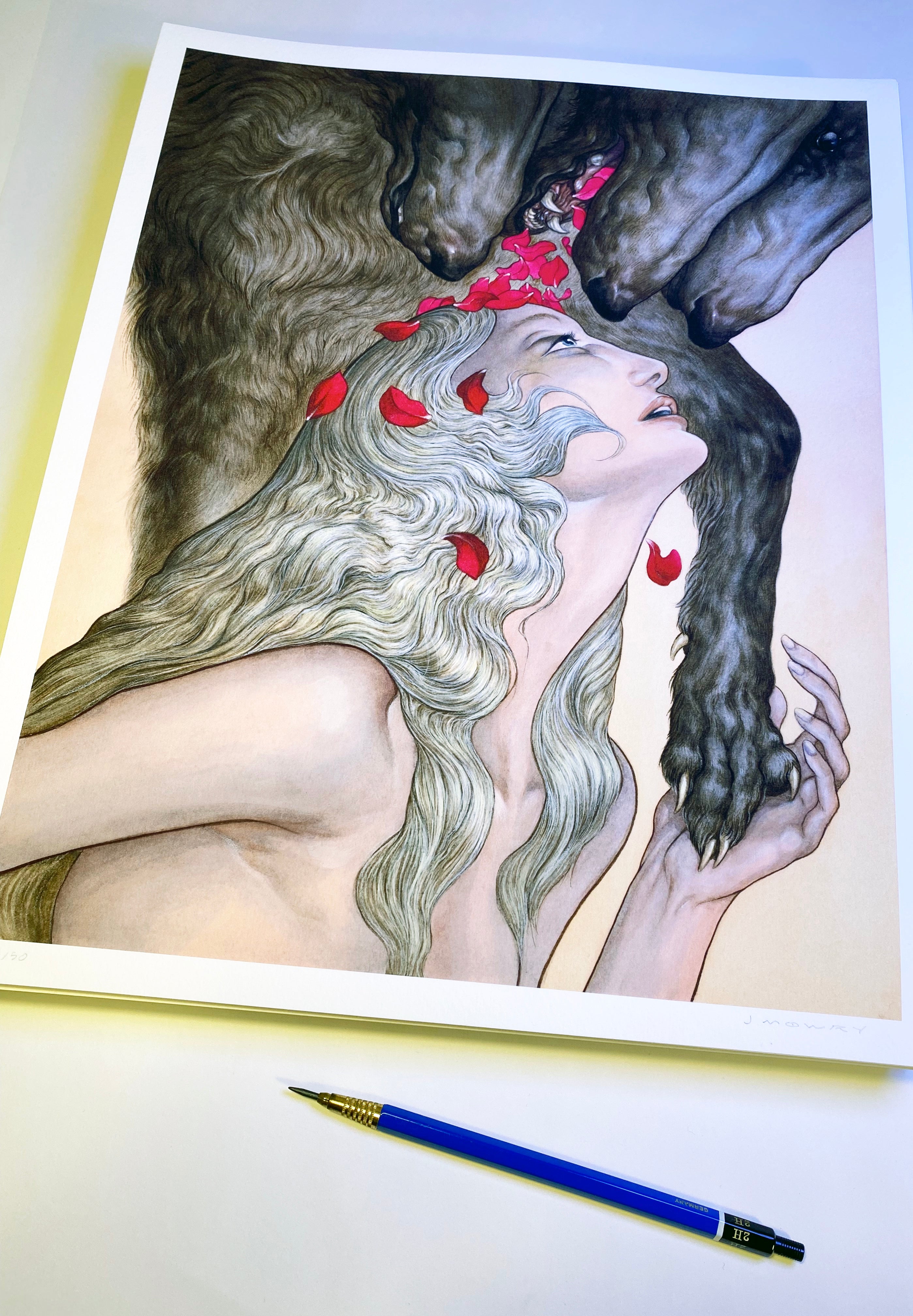 Blessings from the Maw by Jason Mowry features a woman with flowing hair gazing at a black animal, possibly a wolf, amidst cascading red rose petals. This exquisite archival pigment print ensures museum-quality preservation, while a blue pen rests on the white surface beside it.