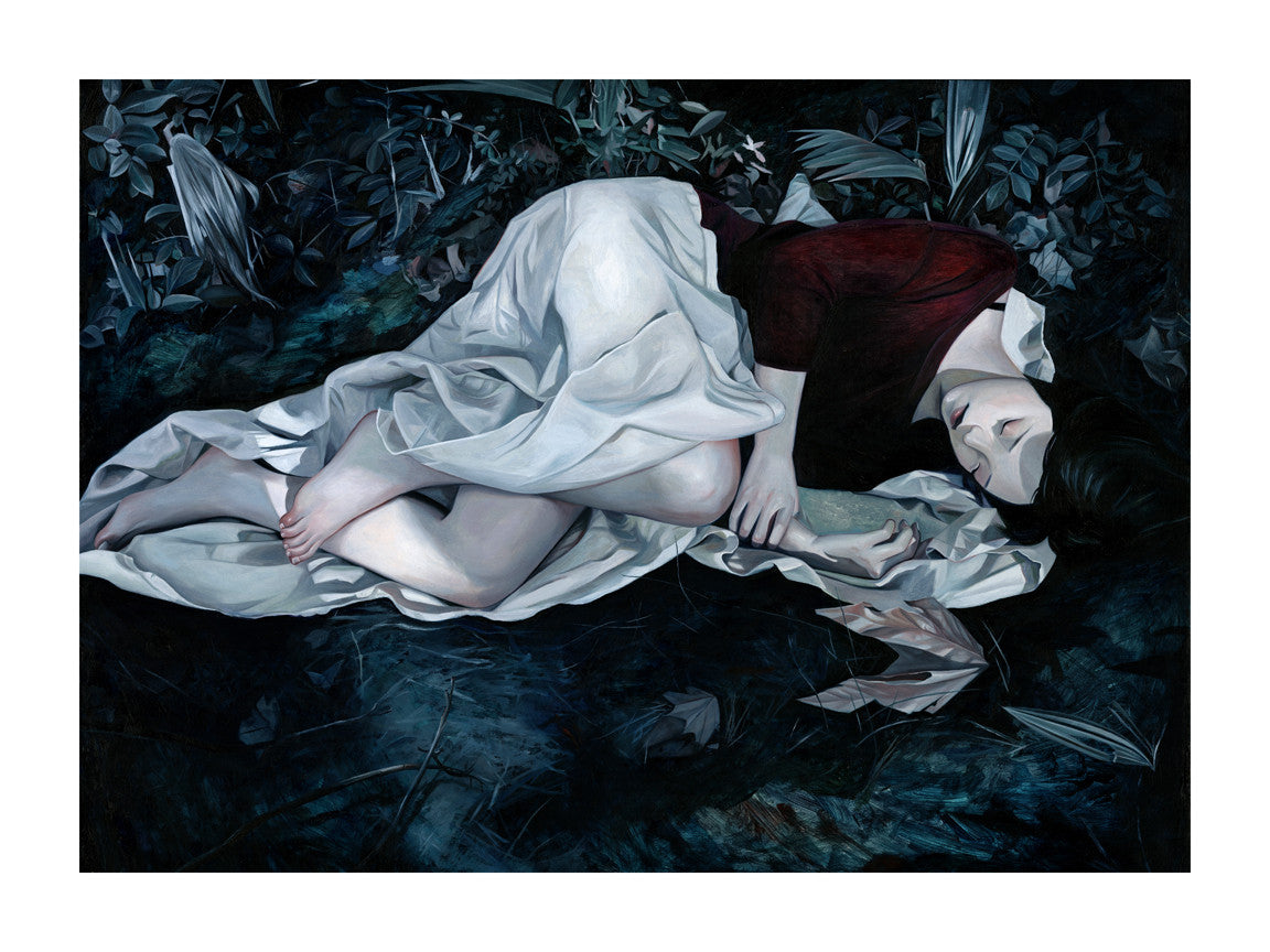 A dark-haired person in a red top and white skirt lies on a leaf-strewn forest floor, creating a serene, dreamlike scene captured in the signed and numbered fine art giclee print Let it Be by Joanne Nam.