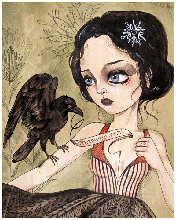This stunning fine art print, Memento Mori by Sandi Calistro, features a wide-eyed woman with dark hair, a white flower, and an abstract leafy background. A black crow perches on her arm with a scroll that reads memento mori.