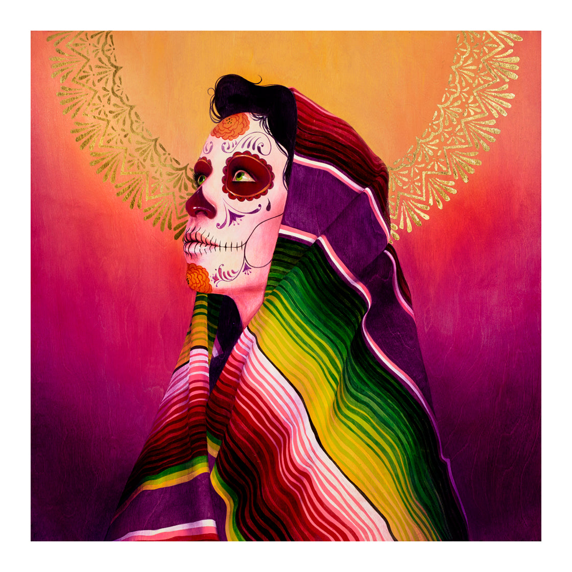 A person with Day of the Dead face paint wears a vibrant striped shawl called Serape Morado. The warm-colored background features circular patterns reminiscent of Sylvia Jis limited edition prints.