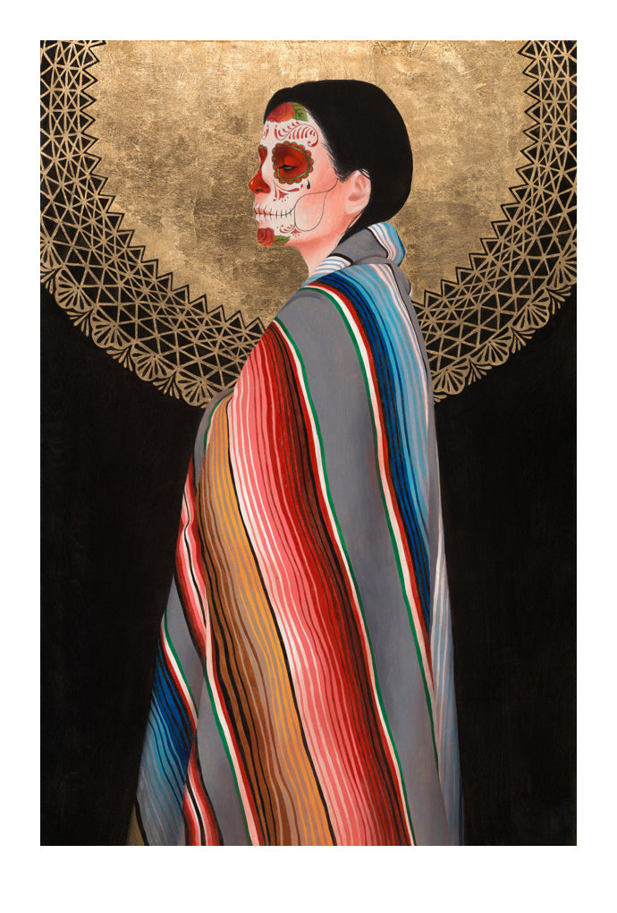 A person with sugar skull face paint is wrapped in a colorful striped blanket, reflecting Sylvia Jis evocative style. An intricate golden circular pattern in the background, similar to the Sol de Oro (Artists Proof) by Sylvia Ji, adds an exquisite decorative element like a fine art print.