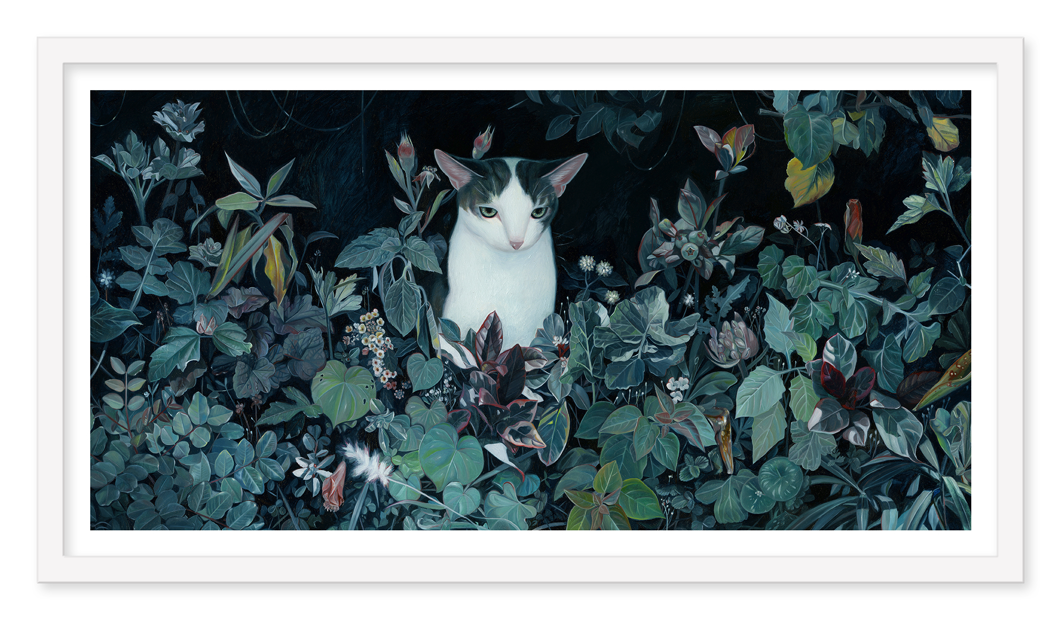 A black and white cat sits in dense greenery with leaves and flowers, crafting a mysterious ambiance. This scene mirrors the A Quiet Soul Hand Embellished Version archival pigment print by Joanne Nam, encased in a white frame.