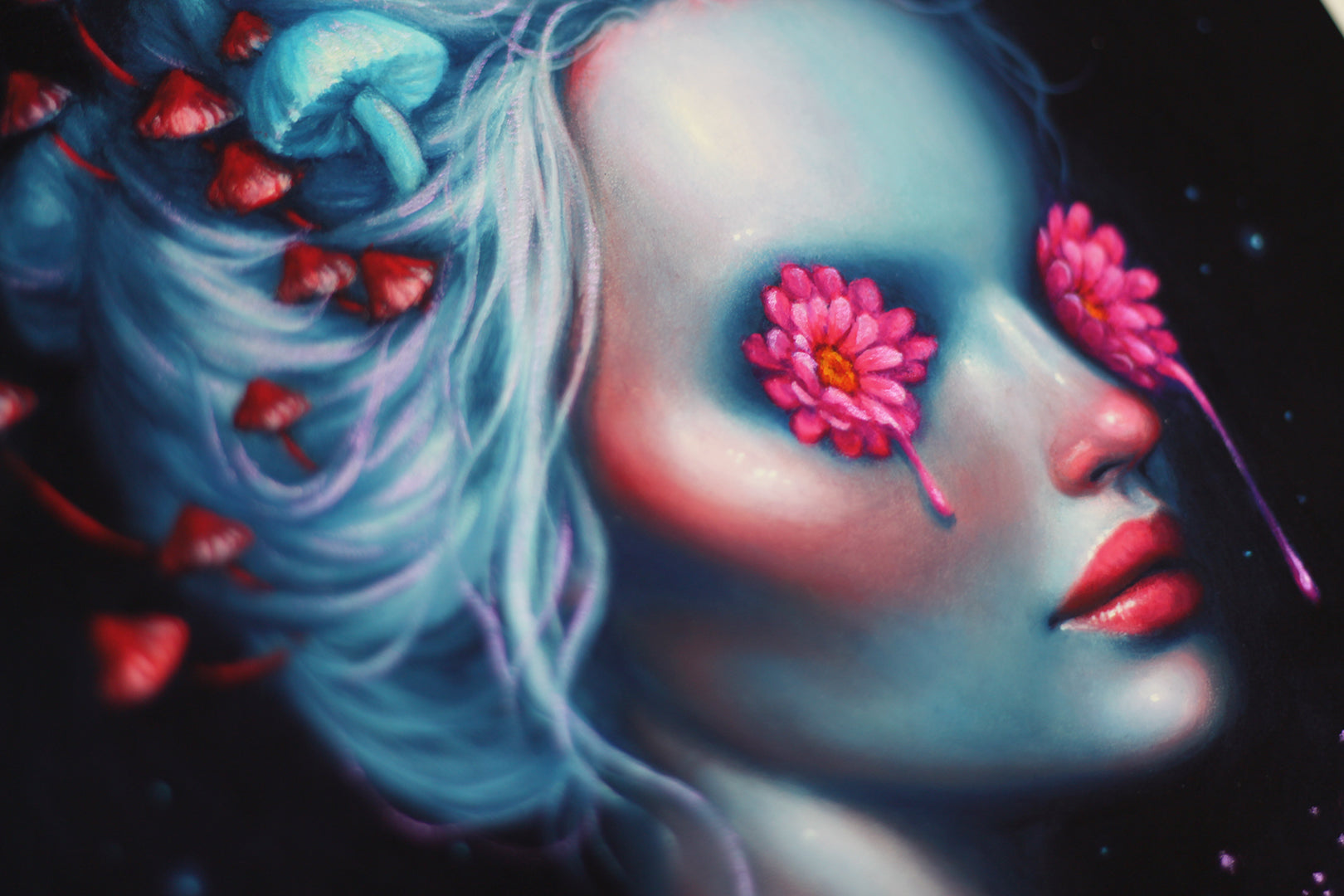 The Lucid painting by Happy D. depicts a woman with blue hair entwined with red mushrooms and her eyes transformed into pink flower petals. This hand-embellished archival pigment print enhances her ethereal face against a dark background.