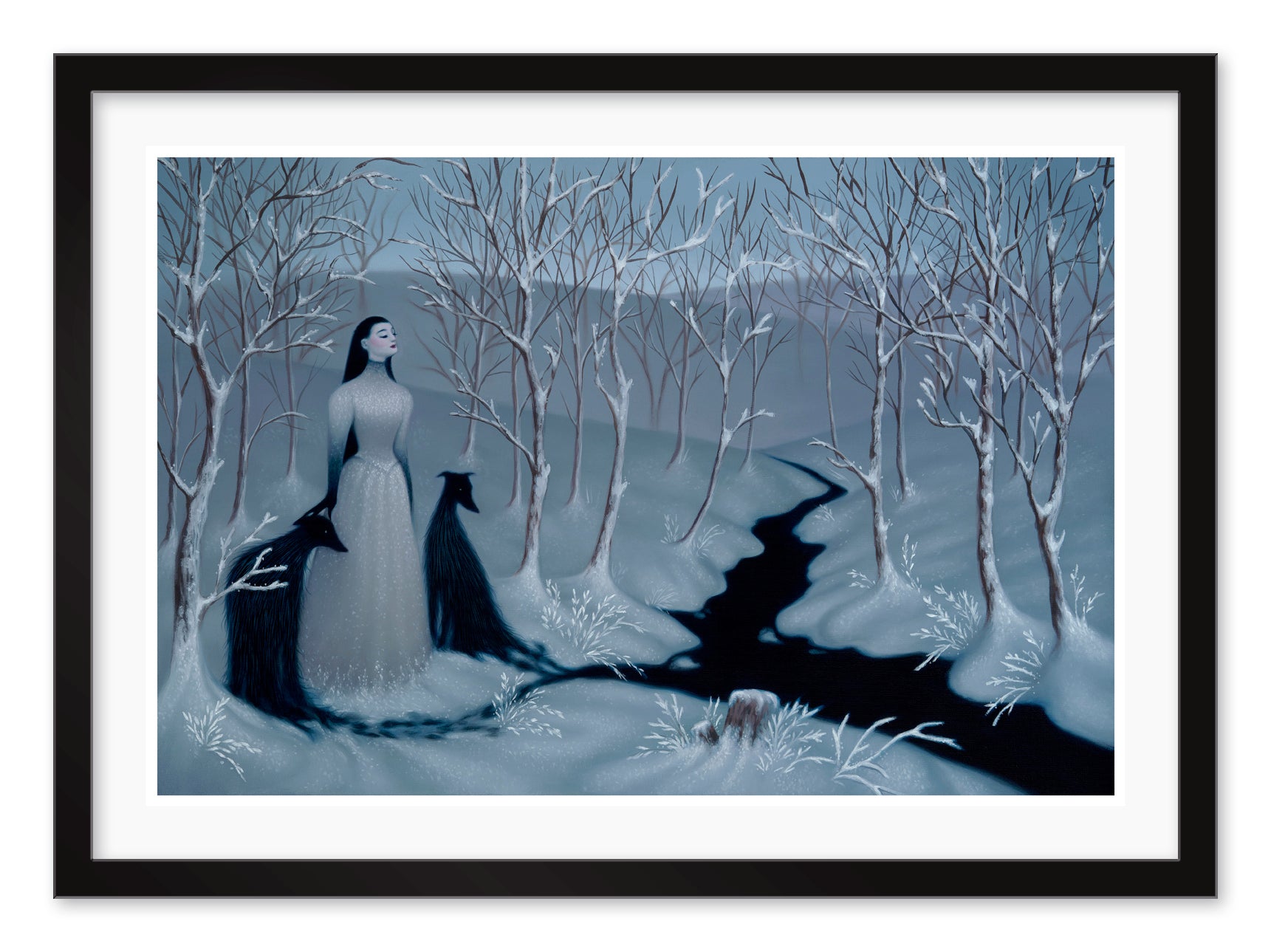 A woman in a white dress stands in a snowy forest with bare trees alongside two dark wolves. A narrow stream winds through the landscape under an overcast sky in Rivus, an archival pigment print by Syd Bee, capturing mystique in this limited edition piece.