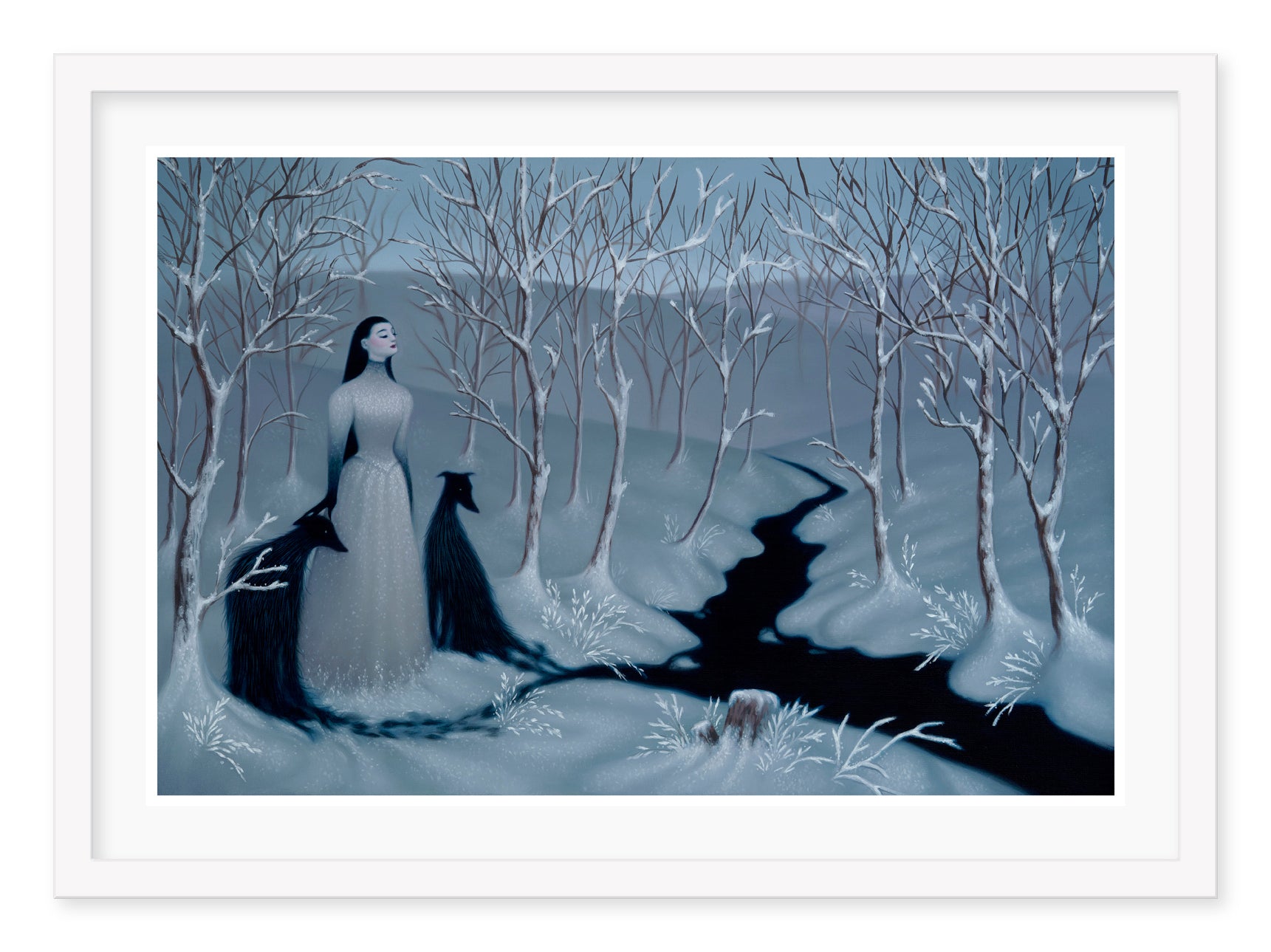 In Syd Bees limited edition archival pigment print Rivus, a woman in a long white dress stands by a winding stream, surrounded by bare trees. Two black dogs sit attentively beside her, and snow blankets the ground, adding to the serene winter atmosphere.